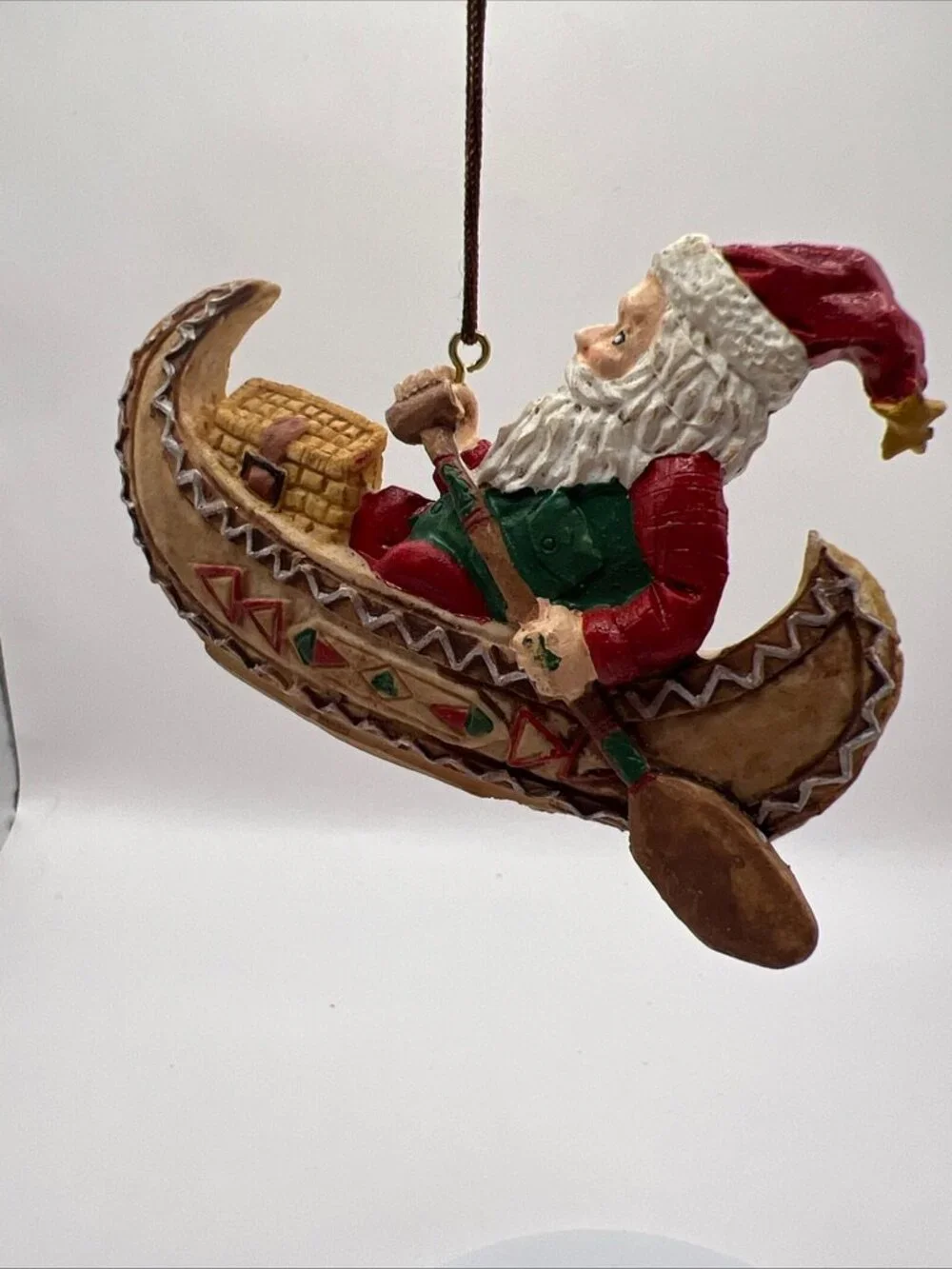 Vtg Santa Paddling His Canoe Folk Art Christmas Ornament 2x3.5”